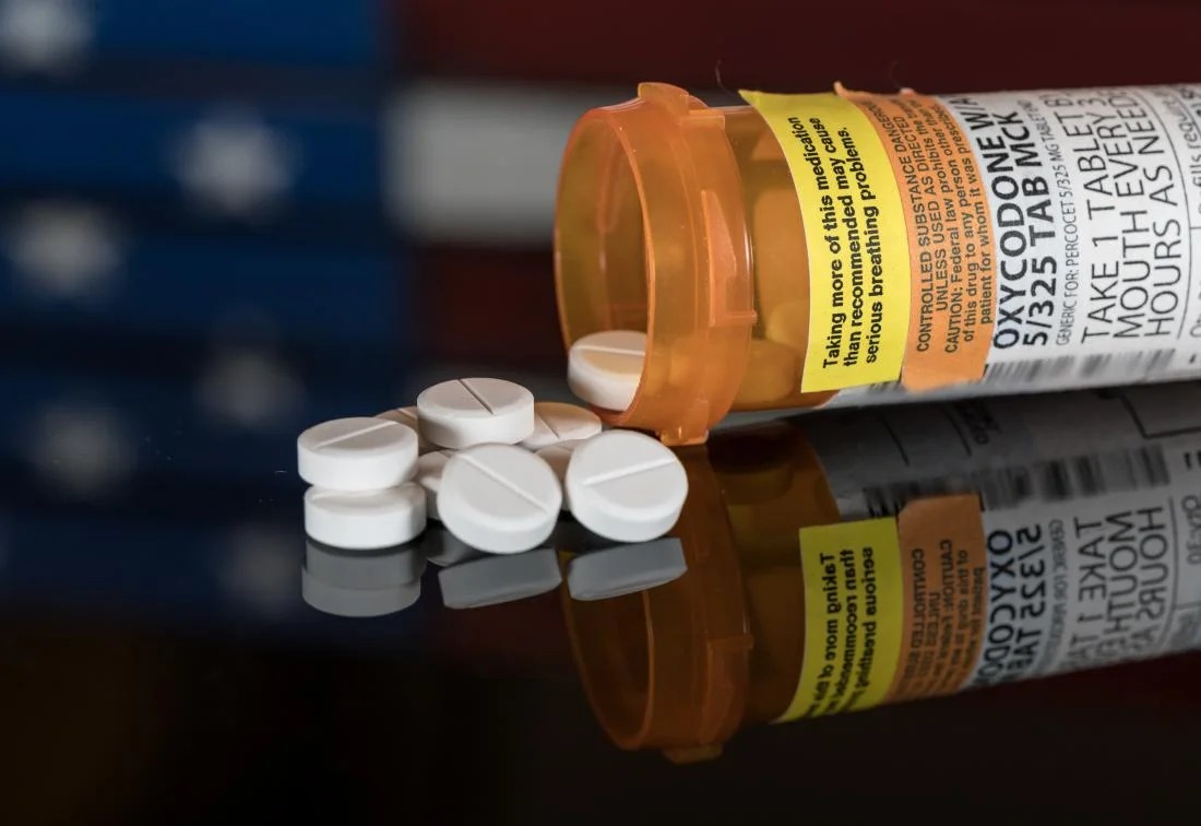 imgi_13_oxycodone-tablet-pills-spilling-out-of-prescription-opioid-bottle